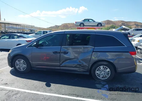 2015 Honda Odyssey Lx z USA, uszkodzony, nr VIN 5FNRL5H2XFB083738